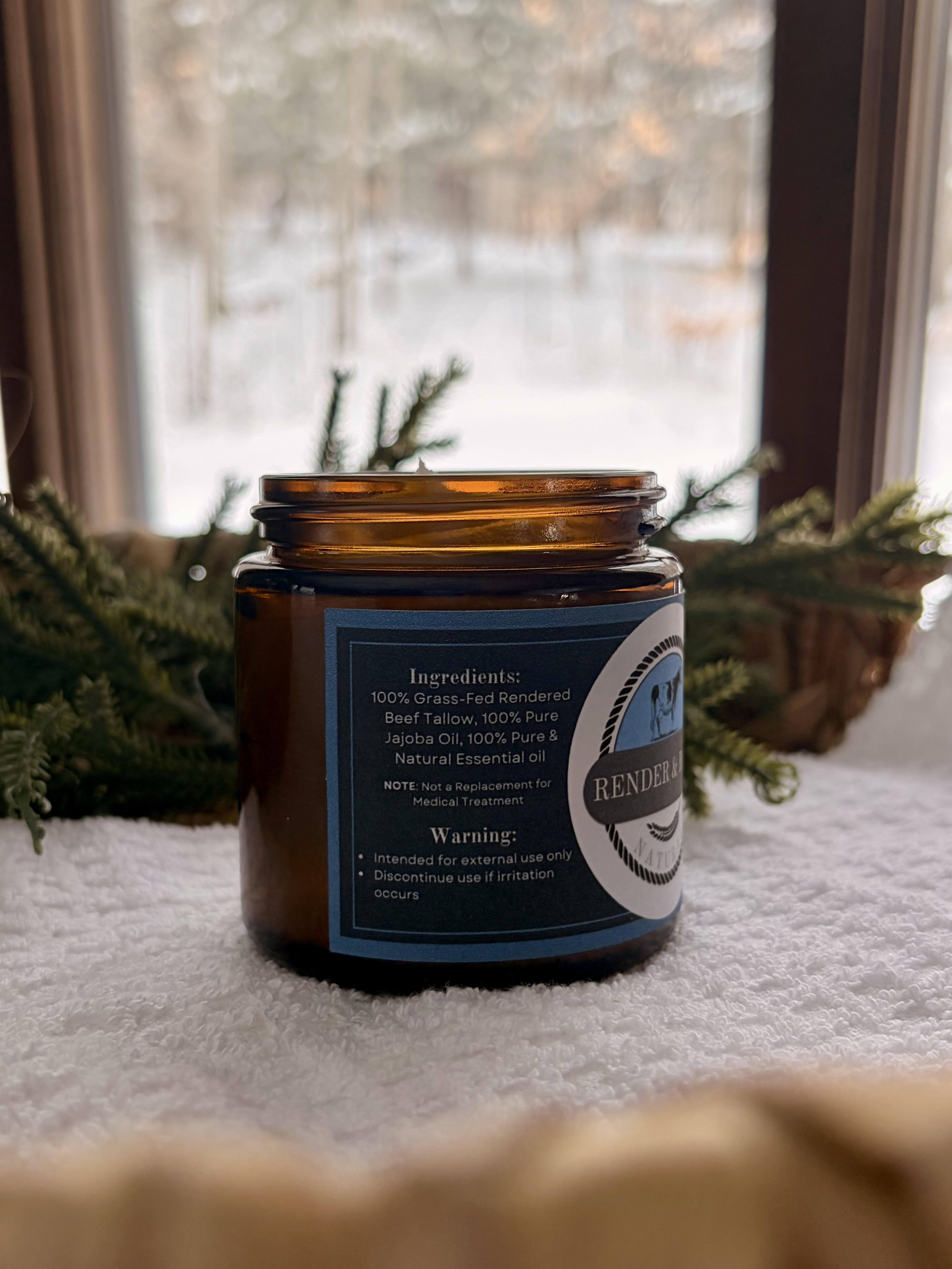 Close-up of Render & Root Naturals product label showing ingredients